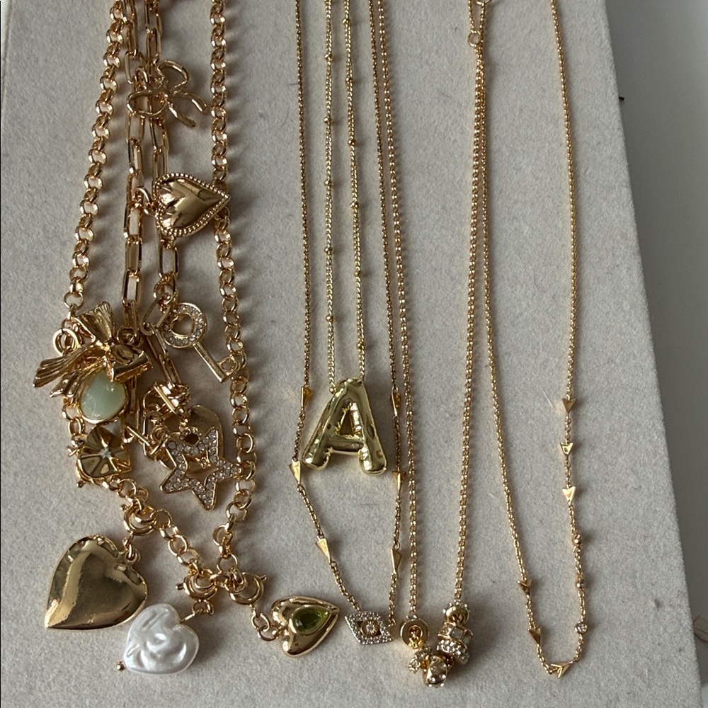 Bundle of Gold Charm Necklaces,  bracelets and earrings